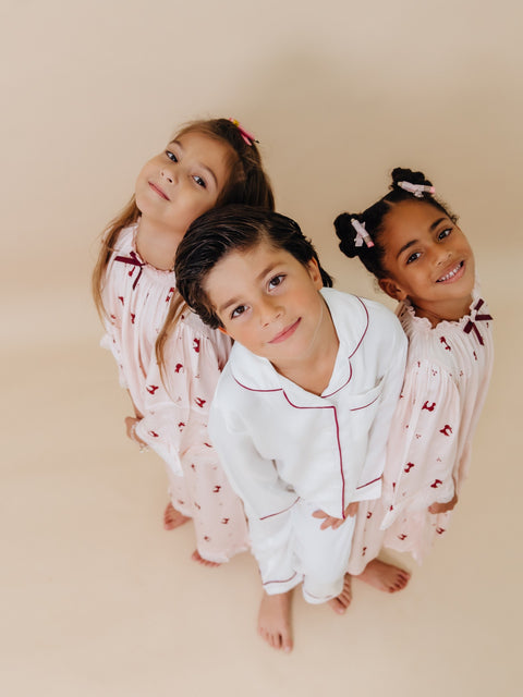 Girls Classic Christmas Pajamas in Pink with Burgundy Bow Accents