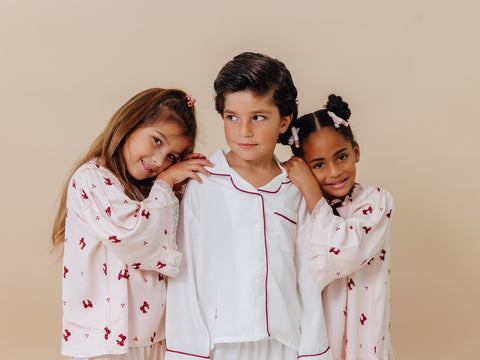 Girls Classic Christmas Pajamas in Pink with Burgundy Bow Accents